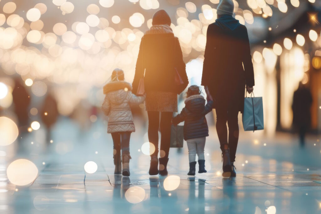 family walking near holiday lights