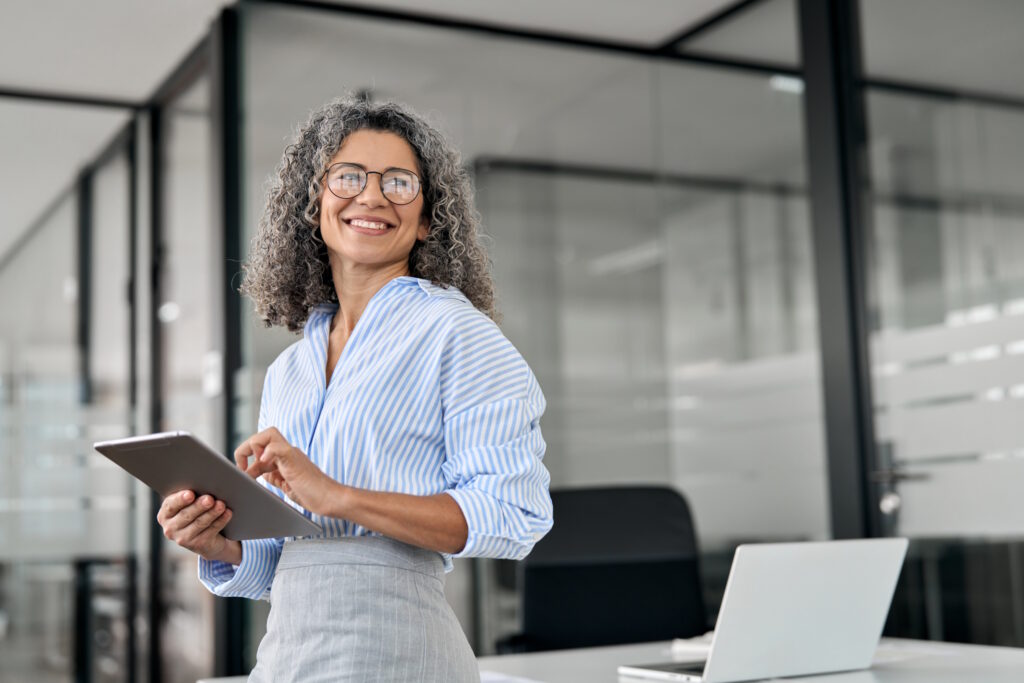 small business owner holding tablet